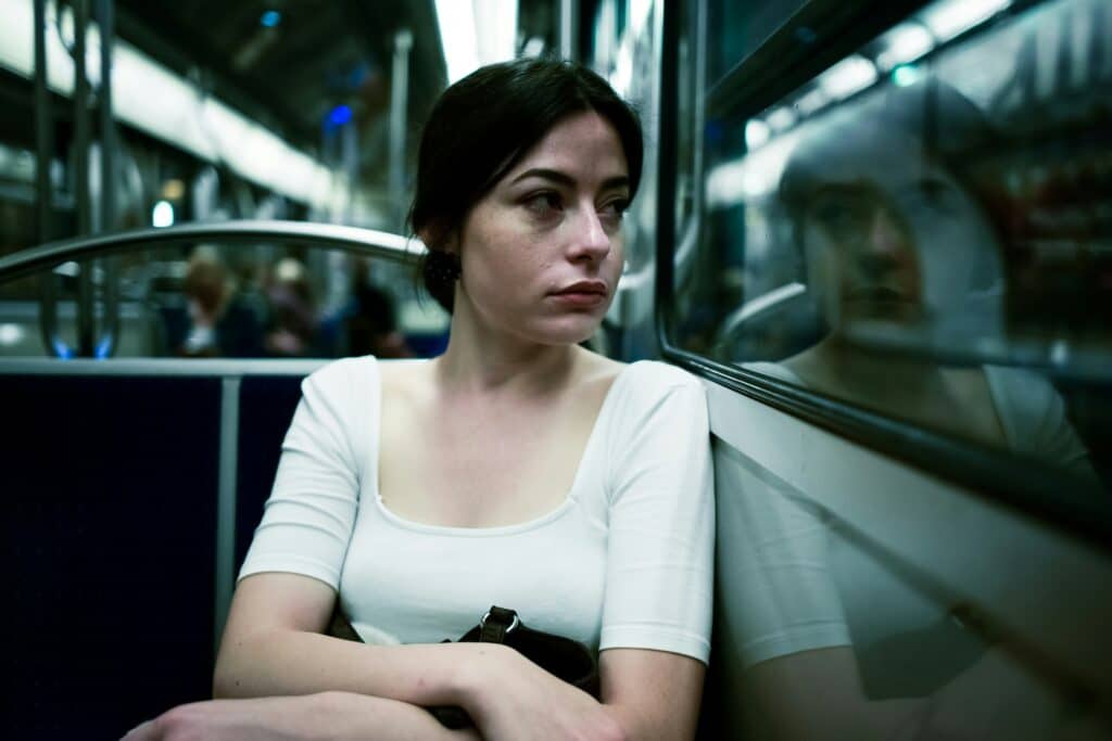 dermatologist long island as depicted by woman on a train