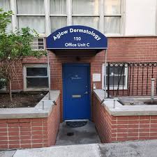 dermatologist who accepts medicaid as depicted by front door of Aglow Dermatology