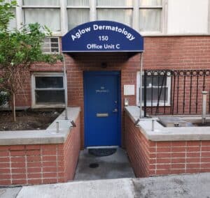 dermatologist recommended as depicted by the front door of the Aglow Dermatology clinic in New York City