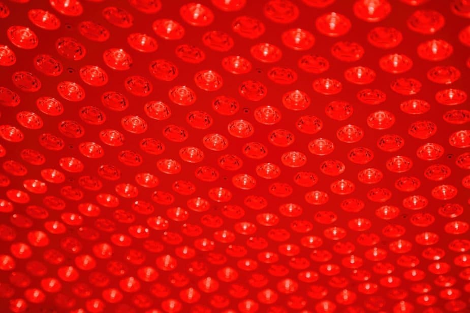 A close-up photo of an LED red light therapy panel.