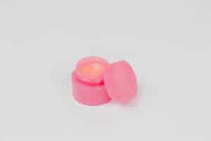 dry lip treatment as depicted by a pot of lip balm