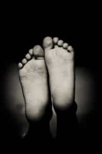 products for athlete's foot as depicted by the soles of feet
