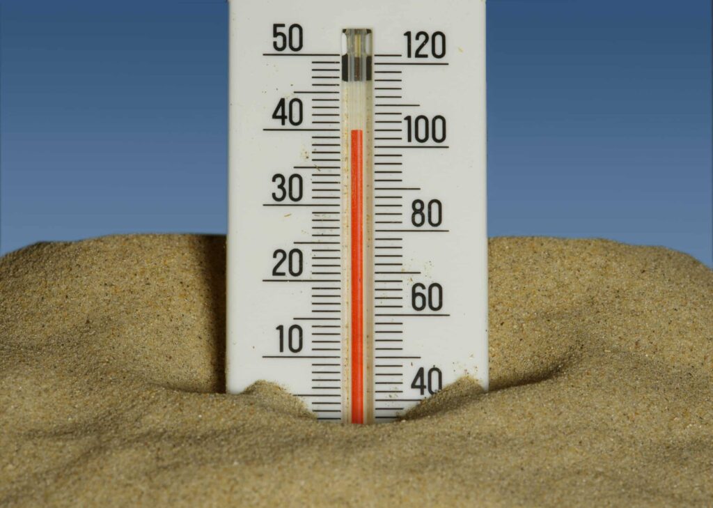 does sunscreen expire as depicted by a thermometer in hot sand